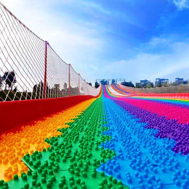 公園景區(qū)游藝項目彩虹滑道 網(wǎng)紅戶外無動力七彩旱雪滑道游樂設(shè)備